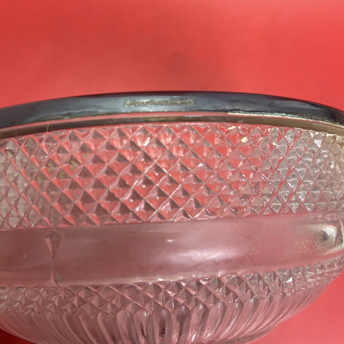 Vintage pressed glass bowl with silver rim and fork with spoon