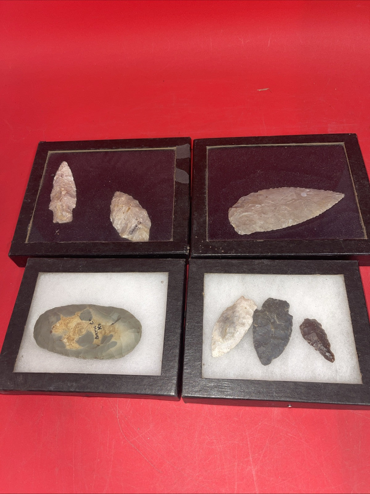 Native American Arrowheads collection in glass case, framed.