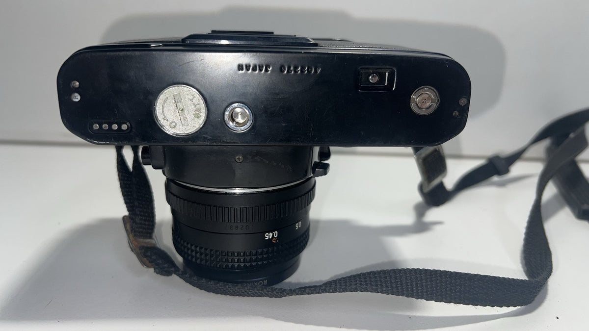 CHINON CE-4 Vintage 35mm SLR Film Camera with Rokinon 49mm- Untested