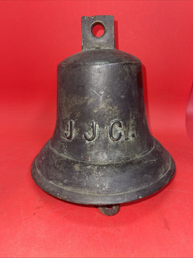 Antique naval bell with the inscription JJC