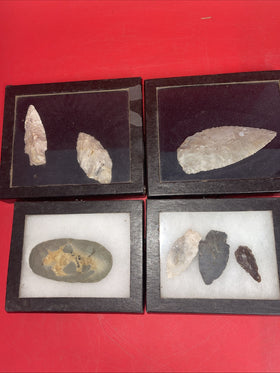 Native American Arrowheads collection in glass case, framed.