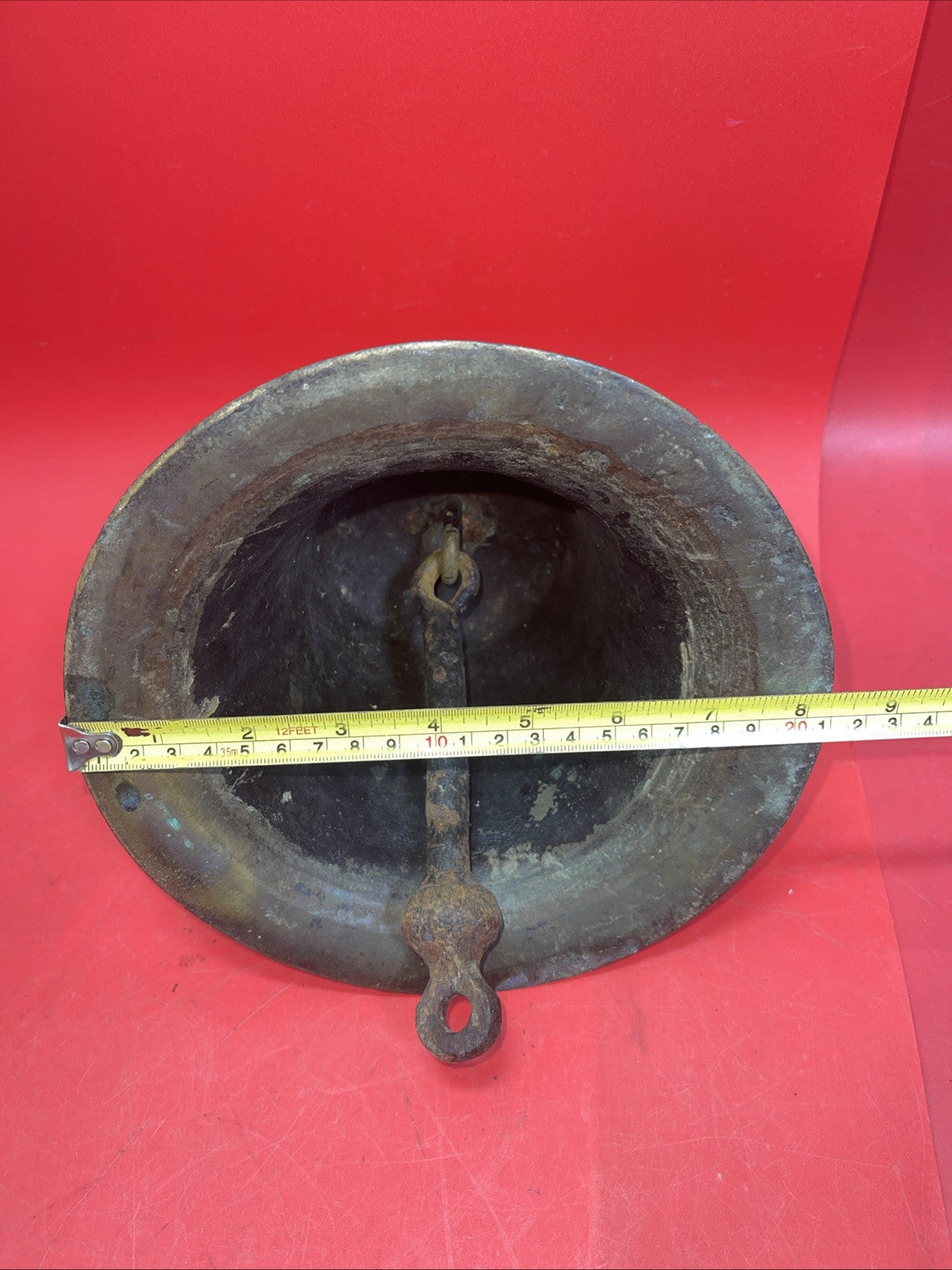 Antique naval bell with the inscription JJC
