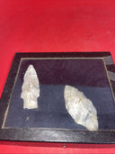 Native American Arrowheads collection in glass case, framed.