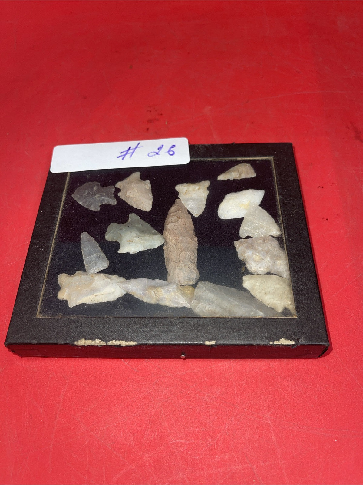 Native American Arrowheads collection in glass case.#26