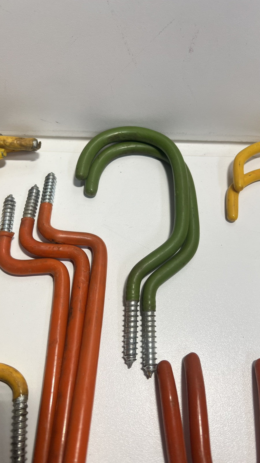 USED Assorted Vinyl Screw in ladder hooks & Large Utility Storage screw in hooks