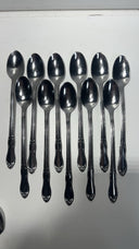 Simeon L & George H Rogers Oneida Xtra Jasmine Flatware Set / 48 Pieces