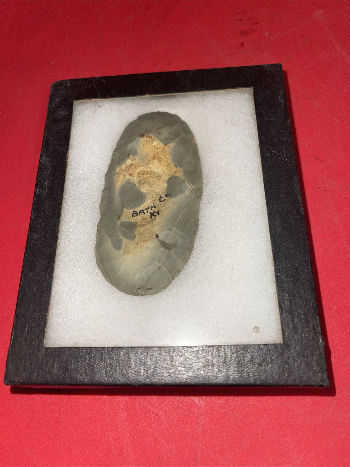 Native American Arrowheads collection in glass case, framed.