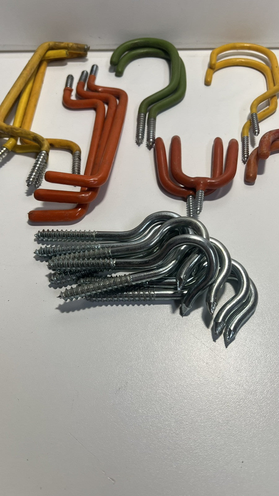 USED Assorted Vinyl Screw in ladder hooks & Large Utility Storage screw in hooks
